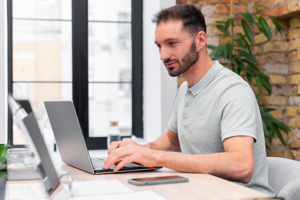 A person typing on a laptop.