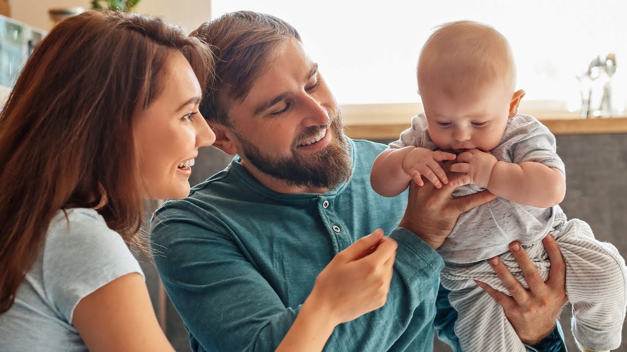 Happy couple with a new born