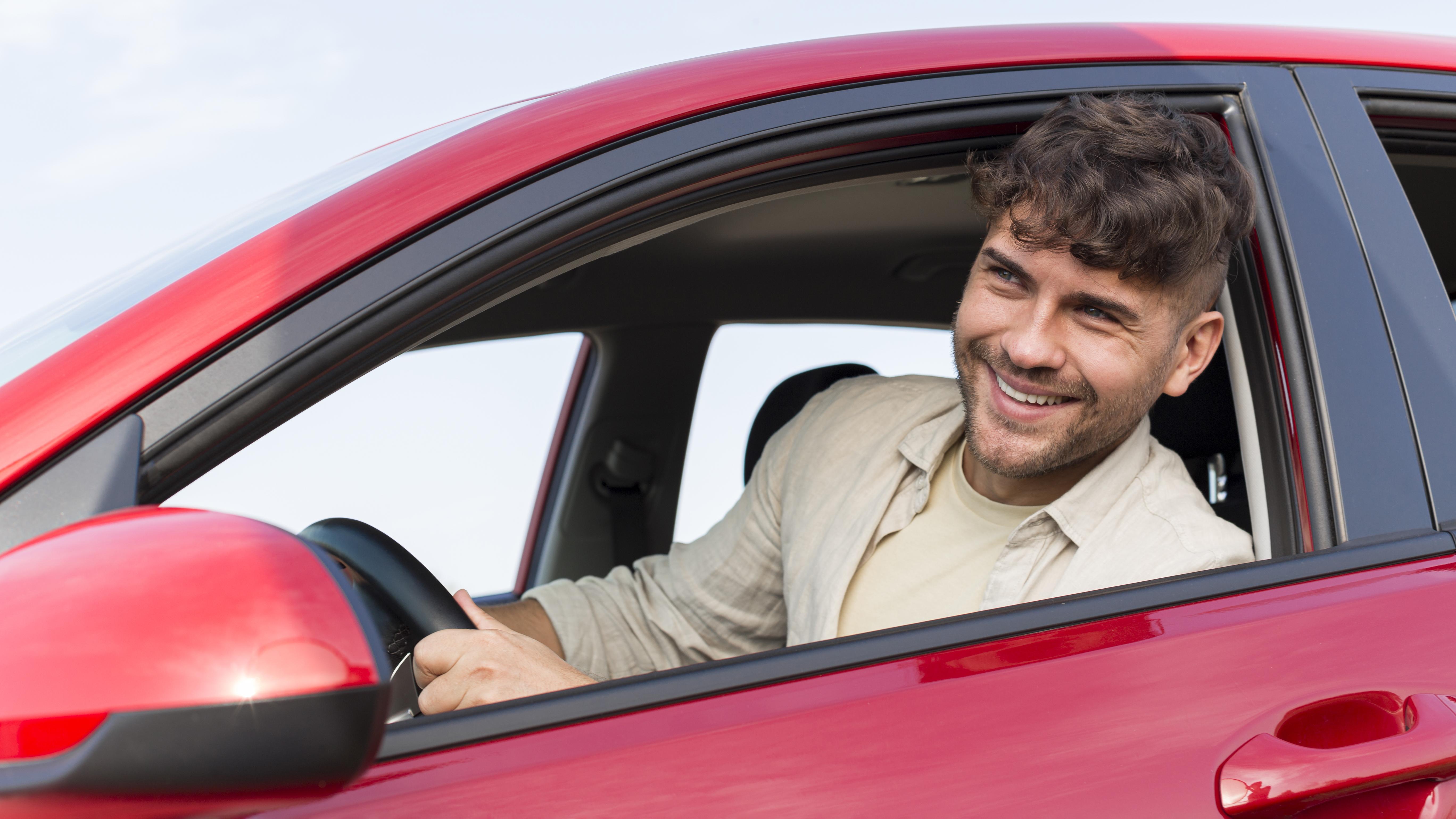 medium-shot-smiley-man-inside-car